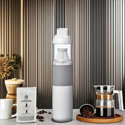 Groene, kleine, oplaadbare koffiepoederreiniger voor bureau