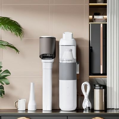 Groene, kleine, oplaadbare koffiepoederreiniger voor bureau