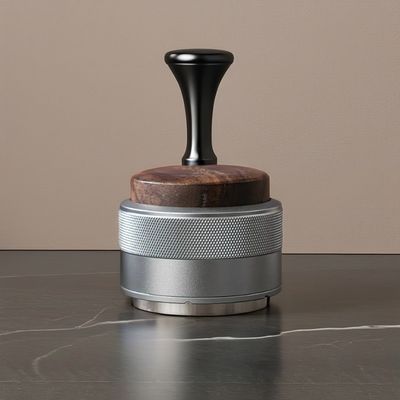 Koffiebedrijver van roestvrij staal met groene decoraties