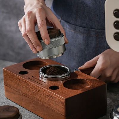 Koffiebedrijver van roestvrij staal met groene decoraties