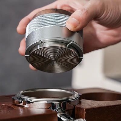 Koffiebedrijver van roestvrij staal met groene decoraties