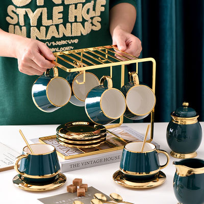 Fancy koffiekopjes met gouden rand Keramische thee set101 met roestvrij staal