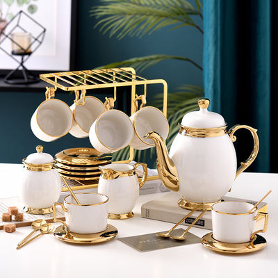Fancy koffiekopjes met gouden rand Keramische thee set101 met roestvrij staal